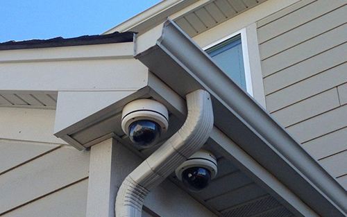 Two Cctv Cameras Installed On A House