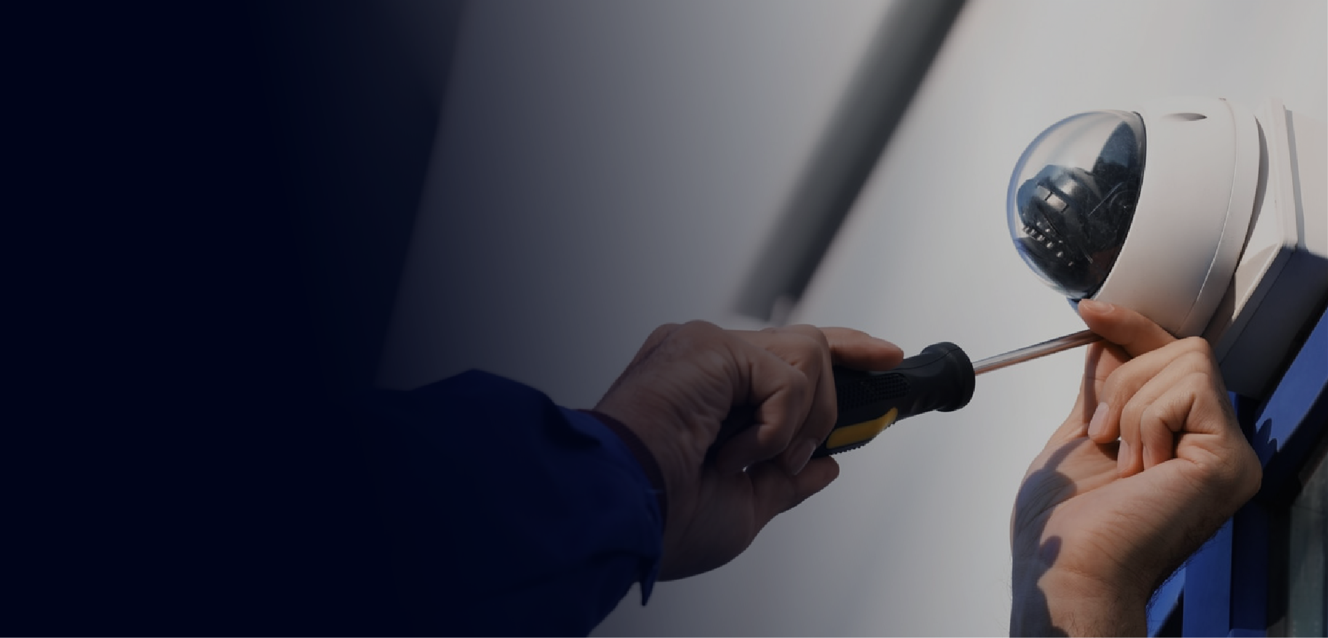 Security camera installation on commercial building exterior