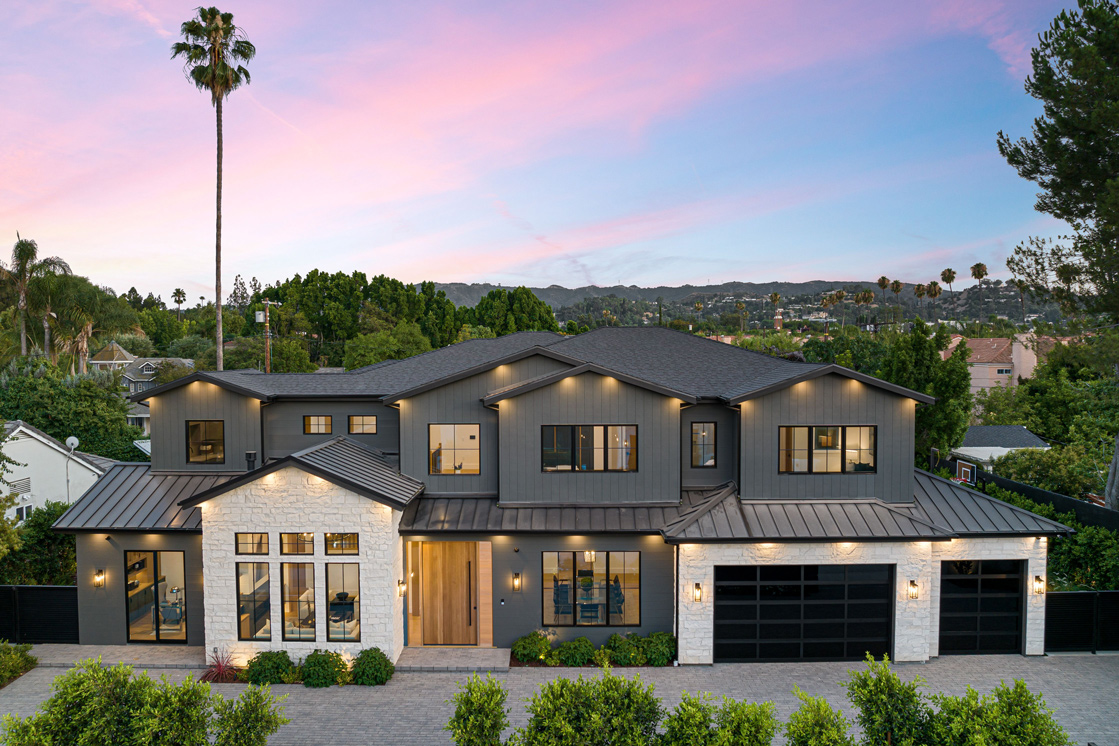 Modern residential home exterior at sunset