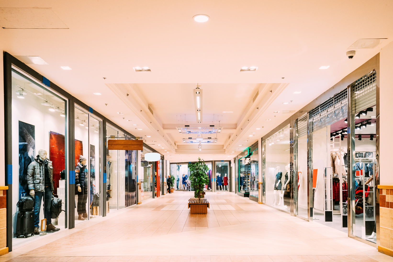 Retail shopping mall corridor with storefronts